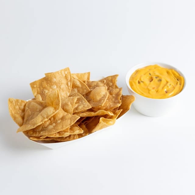   Fries with cheese dip.